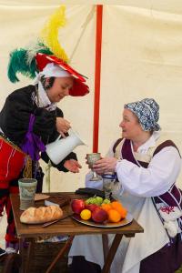 two ladies dressed in medieval garb
